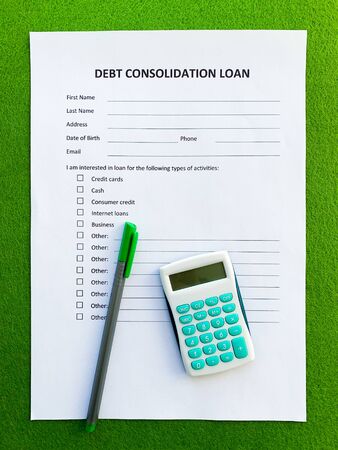 Debt consolidation loan document with graph on tableの写真素材
