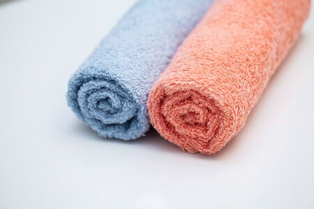 Towels on white table in bath room background