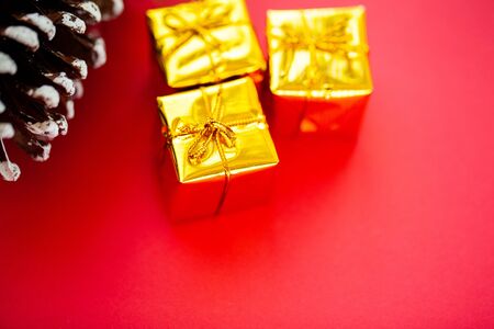 Christmas red decorations, for tree branches on red background.の写真素材
