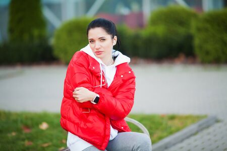 Fitness. Woman have accident injury and hurt at arms while workout at outdoor, muscle pain concept.