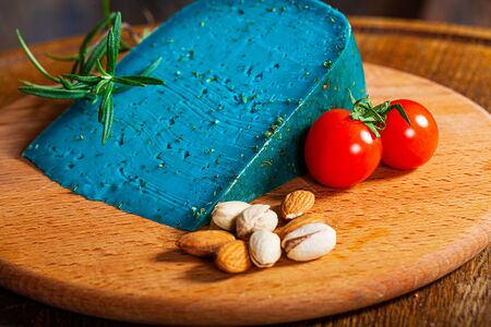 Chunk of blue cheese on wooden backgroundの写真素材