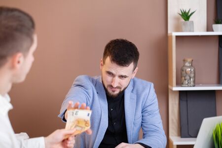 Business man refusing money to take the bribe the concept of corruption and anti bribery