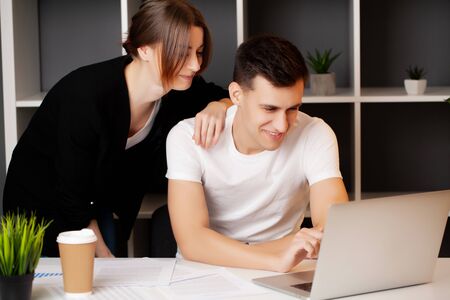 Employee offering favorable trick for signing the agreementの写真素材