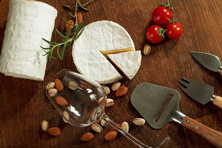 Expensive elite cheese on a wooden backgroundの写真素材