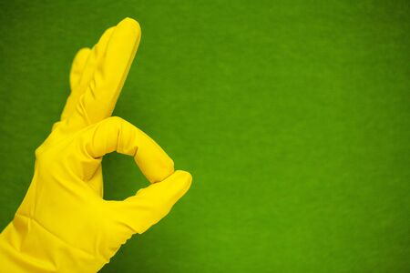 Product for professional cleaning on green background.の写真素材