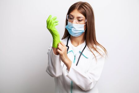 Medicine concept, female doctor in clinic wears personal protective equipment