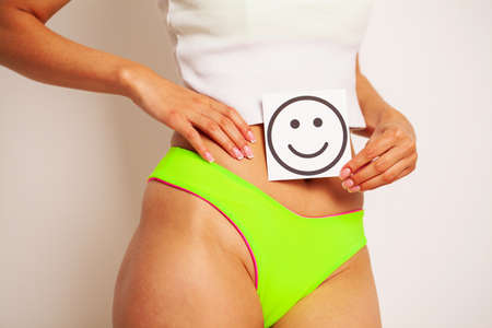 Women Health, Beautiful Female Body In Panties With Smile Card.の写真素材