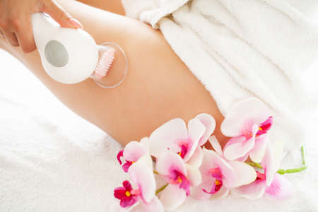 Woman getting LPG massage for skin care in beauty studio