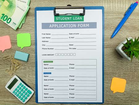 Student loan application form document on tableの写真素材