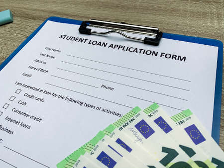 Student loan application form document on tableの写真素材