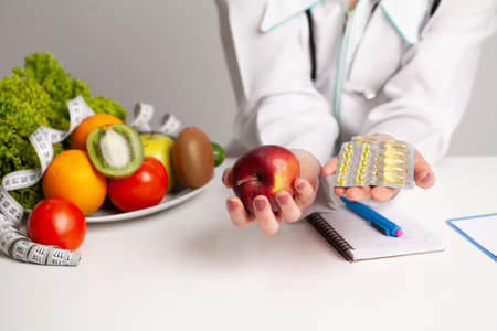 Diet and Healthy concept, nutritionist in her office.の写真素材