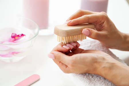 Nails manicure detail with file or brush item.