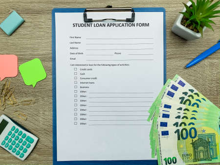Student loan application form document on tableの写真素材