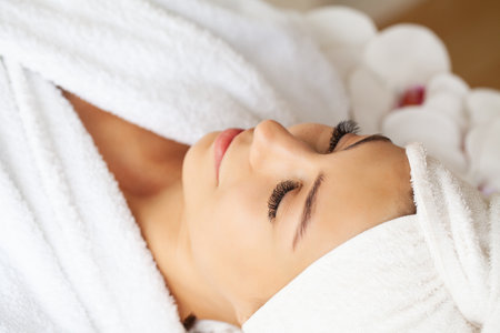 Woman getting spa massage treatment at beauty spa salon.の写真素材