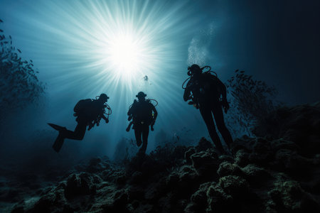 Underwater view on group of scuba divers with instructor in seawaterの素材