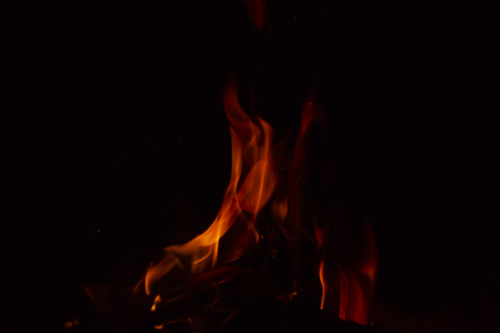 Fire flames on black backgroundの写真素材