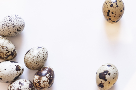 Quail eggs. Group of quail eggs isolated on white background. Closeup photoの写真素材