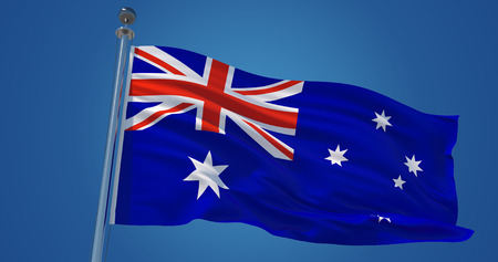 Fluttering silk flag of Australia. Australian official flag in the wind against clear blue sky. 3d renderの写真素材