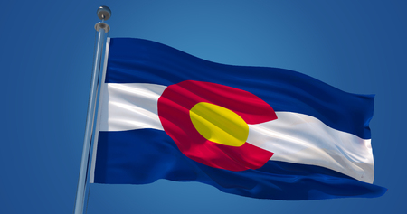 Fluttering silk flag of Colorado, United States of America. Colorado official flag in the wind against clear blue sky. 3d renderの写真素材