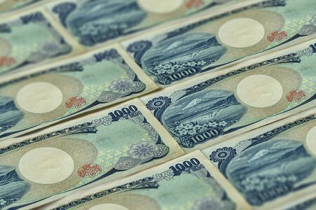 Money of Japan. One thousand japanese yen banknotes. Financial background.の写真素材