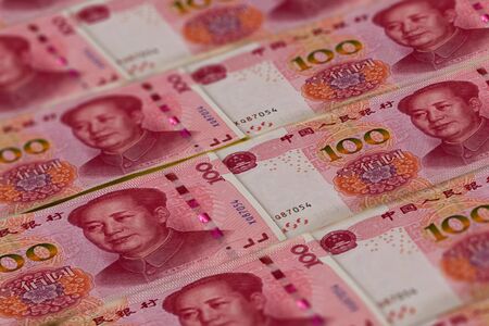 100 Chinese Renminbi banknotes background. China, Beijing.の写真素材
