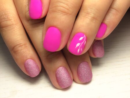 Nails care. Woman hands with pink manicure. Closeup photo. Beauty, healthcareの写真素材