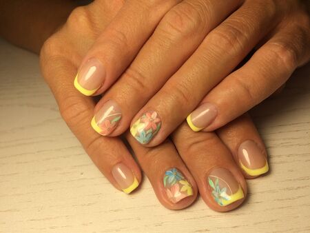Nails care. Woman hands with  manicure on a table. Closeup photo. Healthcareの写真素材