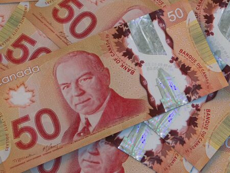 CAD. Canadian currency background. Closeup photo. Dollars of Canadaの写真素材