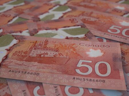 CAD. Canadian currency background. Closeup photo. Dollars of Canada