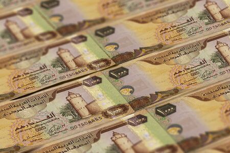 United Arab Emirates Dirham banknotes background. UAE Dirhams pattern. 1000 dirhamsの写真素材