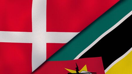 Two states flags of Denmark and Mozambique. High quality business background. 3d illustrationの写真素材