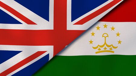 Two states flags of United Kingdom and Tajikistan. High quality business background. 3d illustrationの写真素材