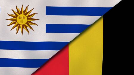 Two states flags of Uruguay and Belgium. High quality business background. 3d illustrationの写真素材