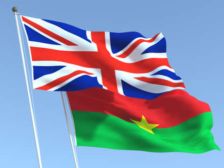 Two waving state flags of United Kingdom and Burkina Faso on the blue sky. High - quality business background. 3d illustrationの写真素材