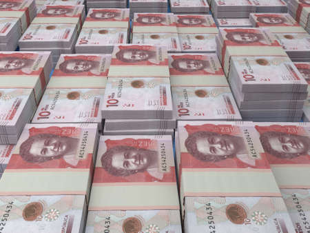 Money of Colombia. Colombian peso bills. COP banknotes. 10 pesos. Business, finance, news background.の写真素材