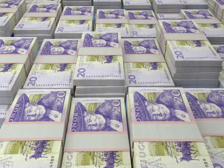 Money of Sweden. Swedish krona bills. SEK banknotes. 20 kronor. Business, finance, news background.の写真素材