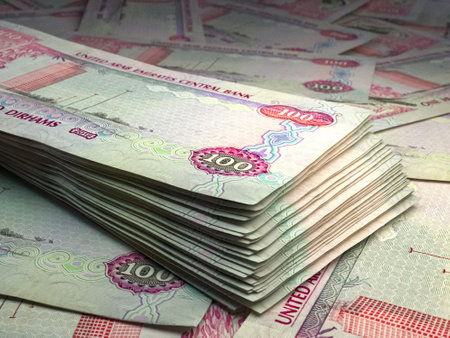 Money of United Arab Emirates. United Arab Emirates dirham bills. AED banknotes. 100 dirhams. Business, finance, news background.の写真素材