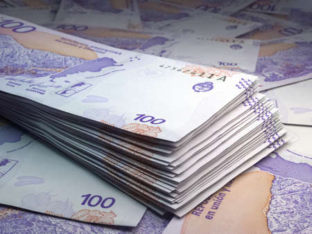 Money of Argentina. Argentine peso bills. ARS banknotes. 100 pesos. Business, finance, news background.の写真素材