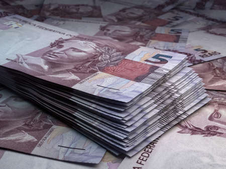 Money of Brazil. Brazilian real bills. BRL banknotes. 5 reals. Business, finance, news background.の写真素材