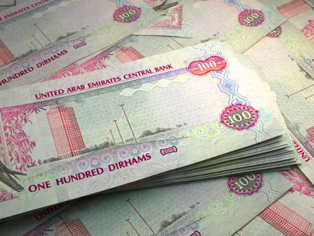 Money of United Arab Emirates. United Arab Emirates dirham bills. AED banknotes. 100 dirhams. Business, finance, news background.の写真素材