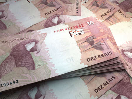 Money of Brazil. Brazilian real bills. BRL banknotes. 10 reals. Business, finance, news background.の写真素材