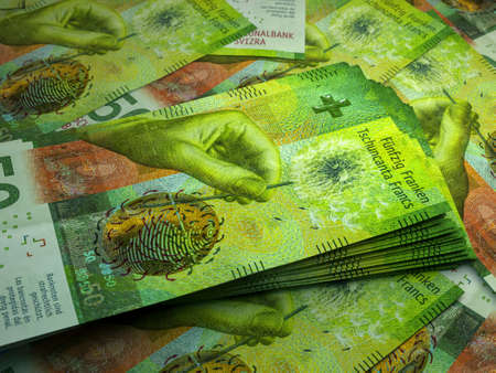 Money of Switzerland. Swiss franc bills. CHF banknotes. 50 francs. Business, finance, news background.の写真素材
