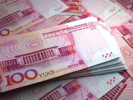 Money of China. Chinese renminbi bills. CNY banknotes. 100 yuan. Business, finance, news background.の写真素材