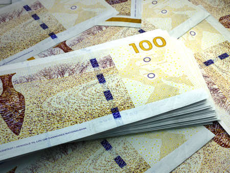 Money of Denmark. Danish krone bills. DKK banknotes. 100 kroner. Business, finance, news background.の写真素材
