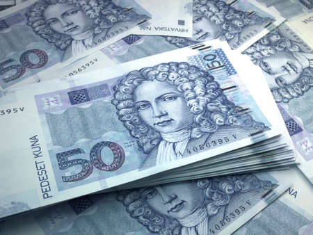 Money of Croatia. Croatian kuna bills. HRK banknotes. 50 euro. Business, finance, news background. 3d illustration.の写真素材