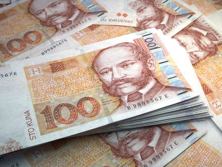Money of Croatia. Croatian kuna bills. HRK banknotes. 100 euro. Business, finance, news background. 3d illustration.の写真素材