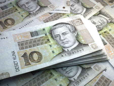 Money of Croatia. Croatian kuna bills. HRK banknotes. 10 euro. Business, finance, news background. 3d illustration.の写真素材