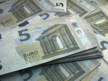 Money of European Union. European euro bills. EUR banknotes. 5 euro. Business, finance, news background.の写真素材
