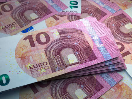 Money of European Union. European euro bills. EUR banknotes. 10 euro. Business, finance, news background.の写真素材