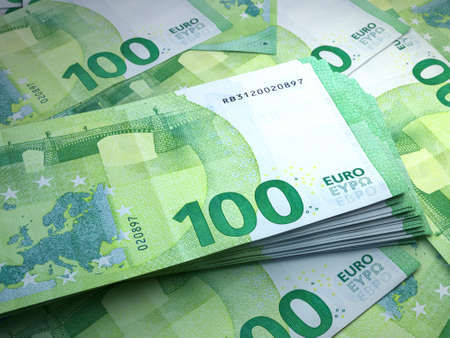 Money of European Union. European euro bills. EUR banknotes. 100 euro. Business, finance, news background.の写真素材